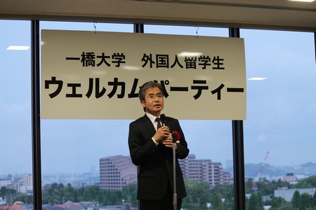 photo: Opening address by President Tadenuma